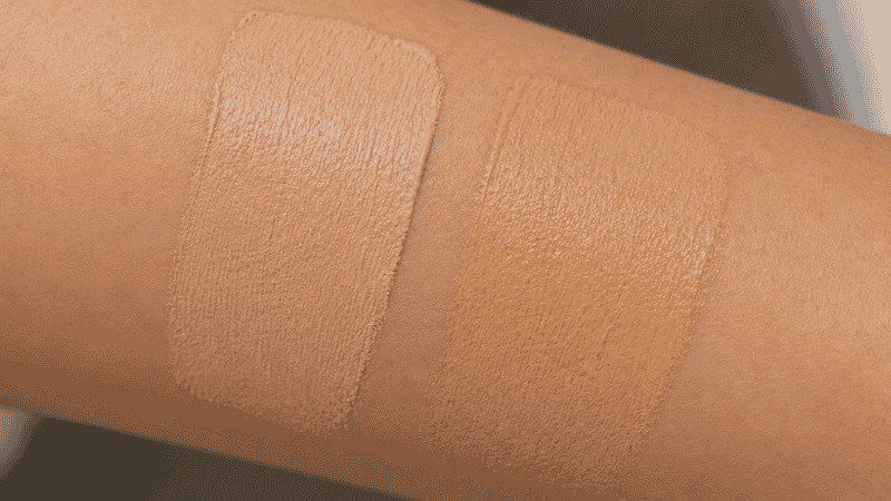 Foundation swatch on skin showing color shift from beige to orange tone due to oxidation