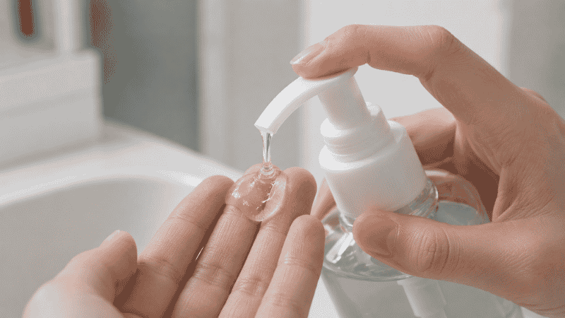 Gentle gel cleanser being dispensed onto fingertips for combination skin morning cleansing routine