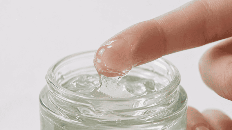 Lightweight gel moisturizer texture being scooped showing water-based formula ideal for combination skin