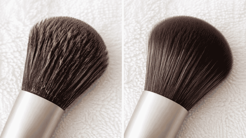 Side by side comparison of a dirty foundation brush with product buildup versus a clean freshly washed brush