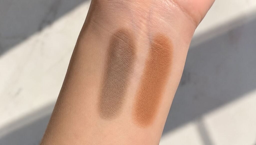 Contour powder swatch in cool taupe beside bronzer swatch in warm orange-brown showing the key color difference